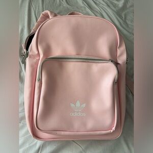 Pink leathery adidas backpack
